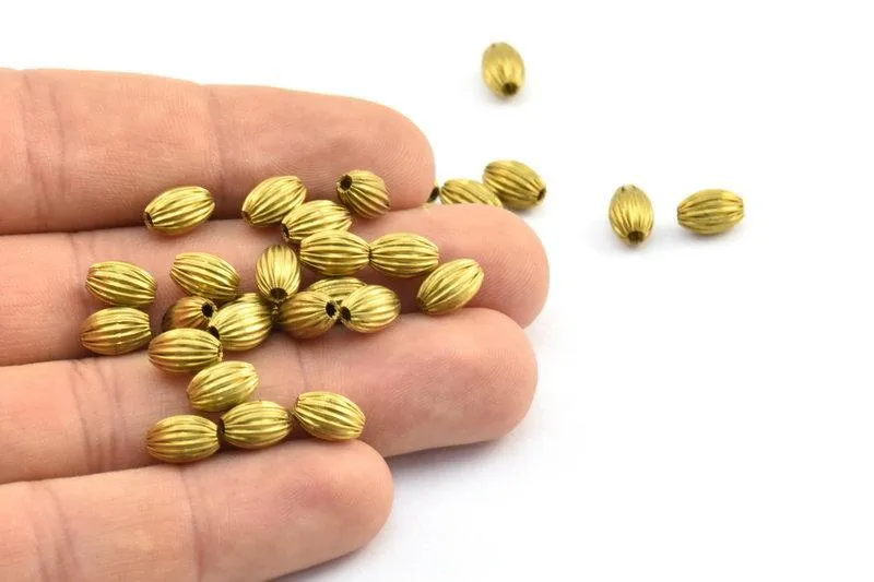 24 Vintage Raw Brass Crimped Textured (9x6mm) Oval Hollow Beads Y246