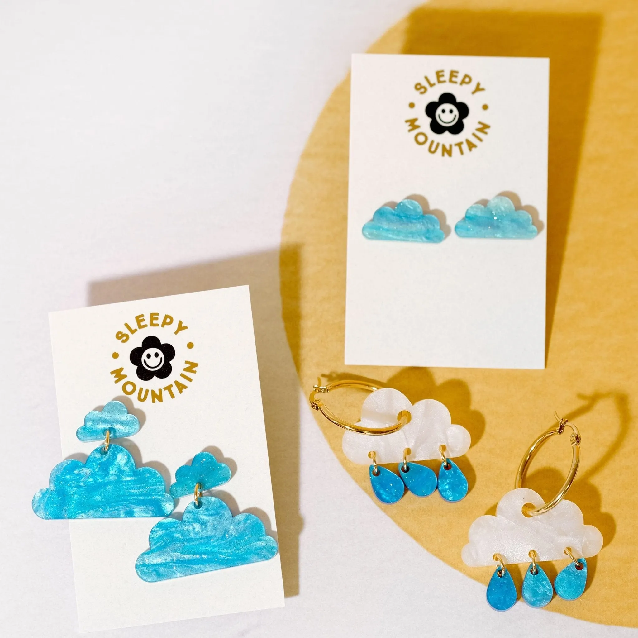 Blue cloud stud earrings